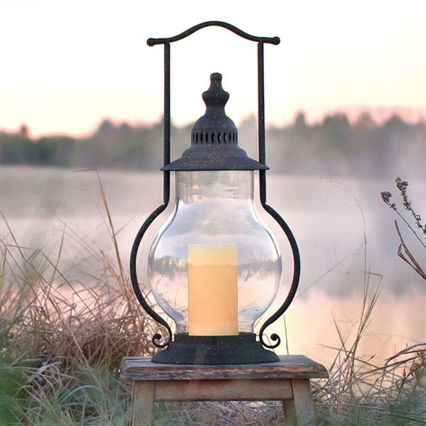 Lantern outside with landscape in the background-Olde Crow Gatherings