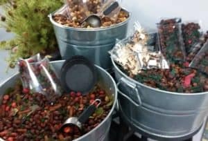 Potpourri of three kinds in big tins with scoops at Olde Crow Gatherings